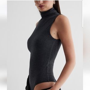 Used Express Body Contour Turtleneck Sleeves Bodysuit green, size XS.